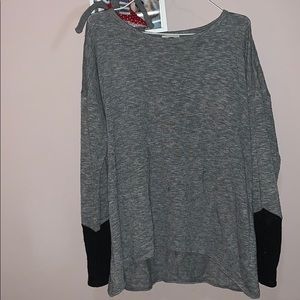 *2/10$* Thin grey and black sweater